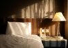 Bed with a lamp on the side