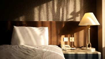 Bed with a lamp on the side