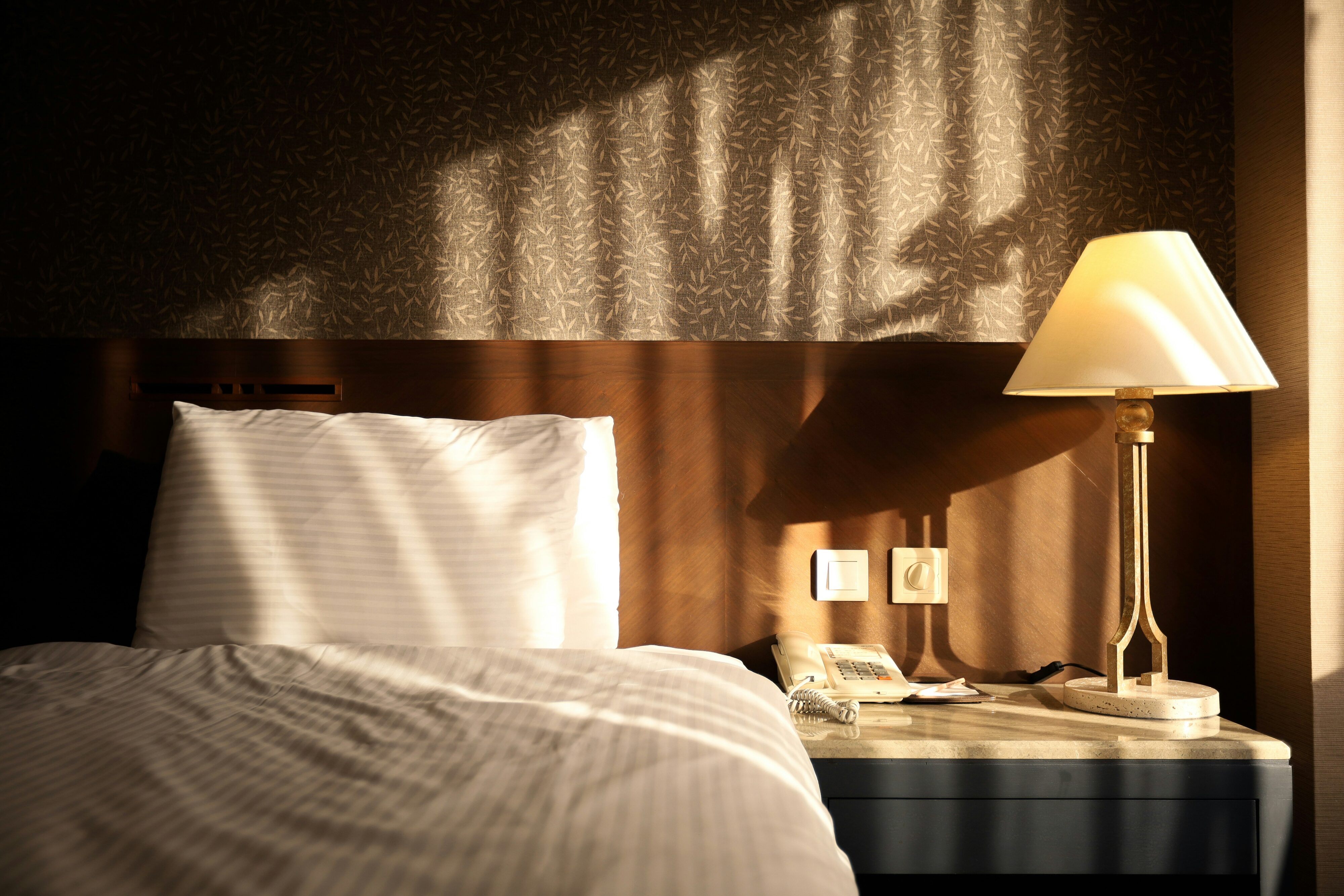 Bed with a lamp on the side